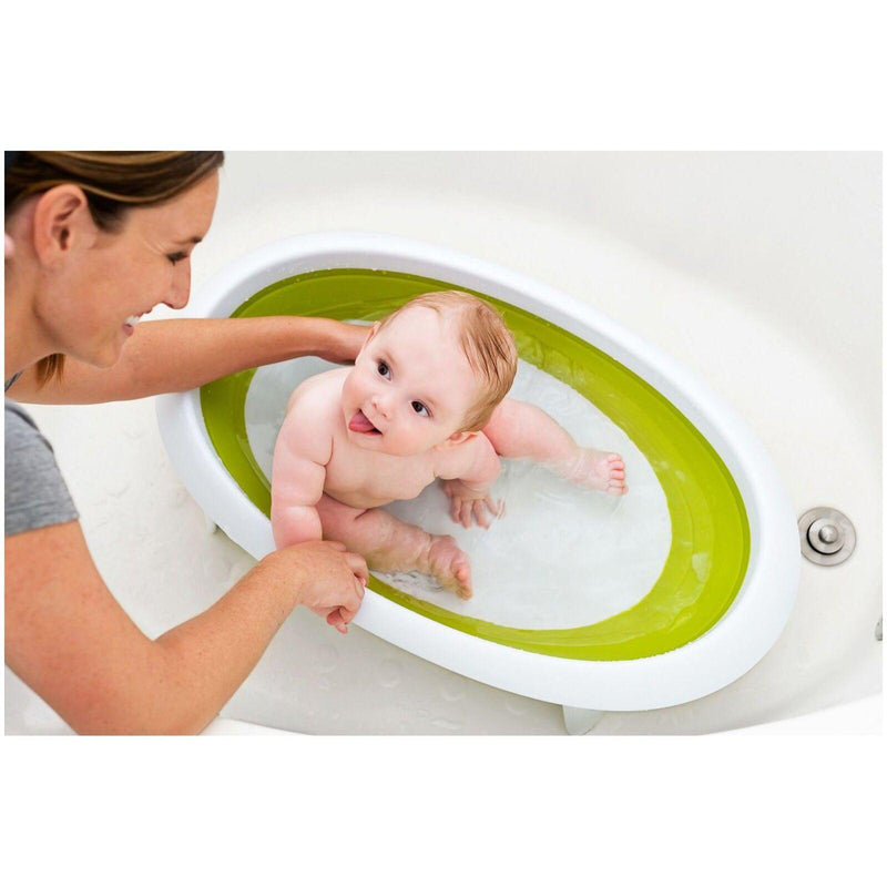 baby naked bath Rear view of naked baby girl peering into bath[11015317409 ...